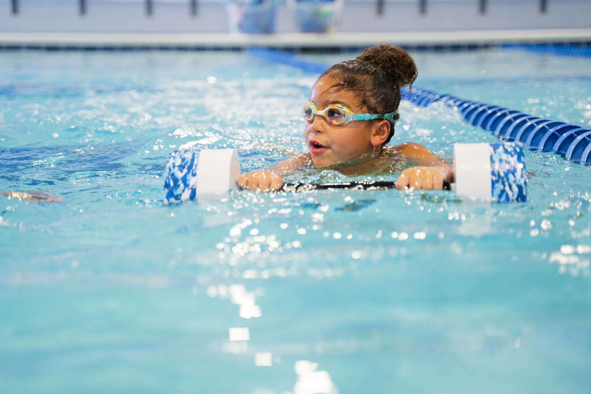 Girl using rhythmic breathing while swimming