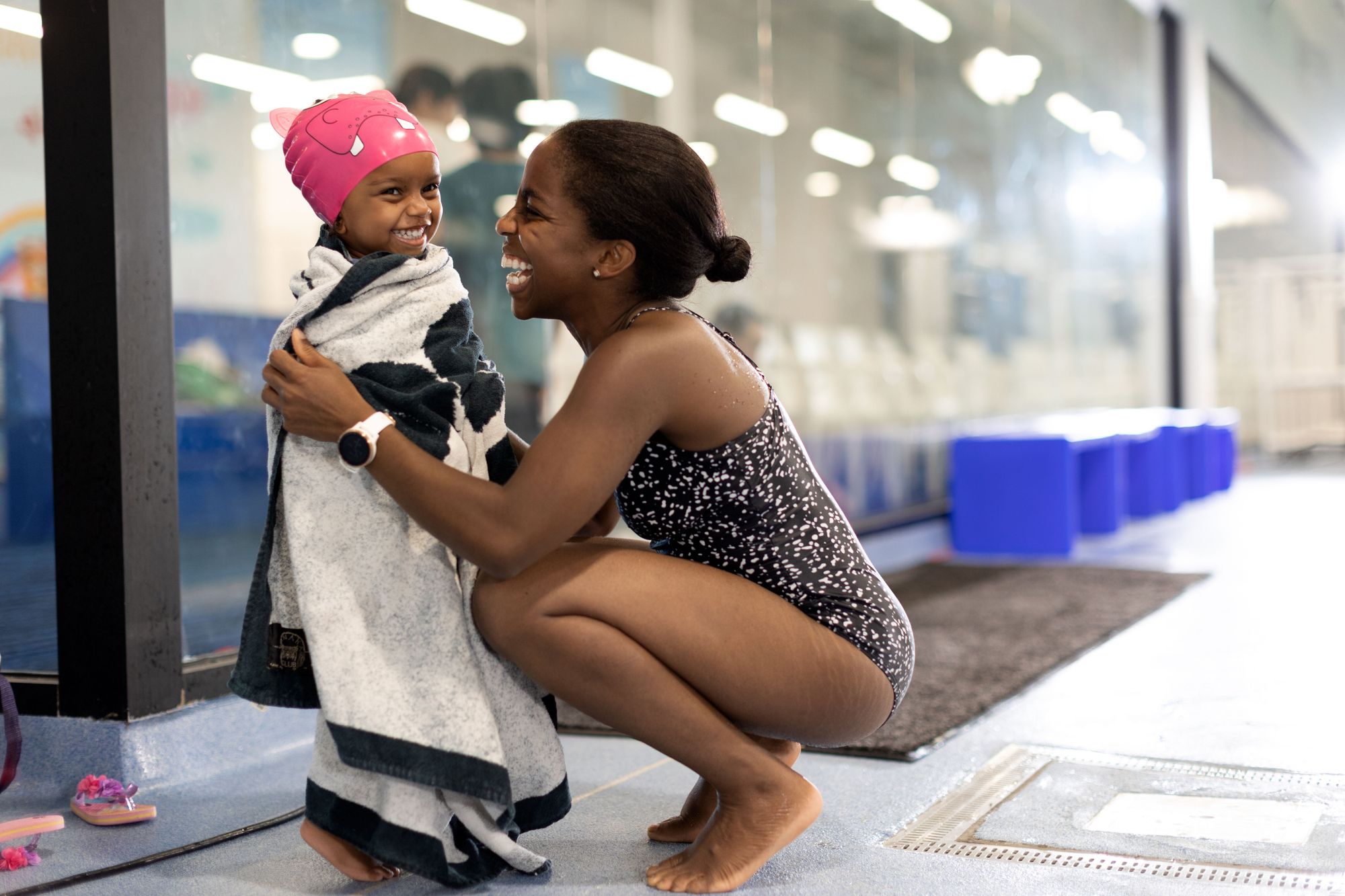 Make sure to include a cozy towel as part of your swim gear and essentials bag!