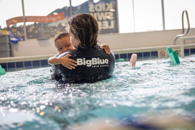 Big Blue teacher and baby swimmer