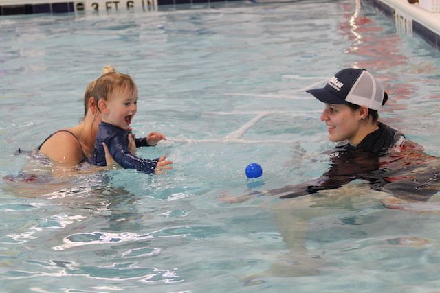 Yasmin teaching one of her Baby Blue swimmers in the pool