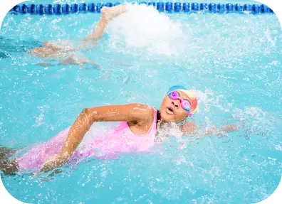 Swimmer practicing freestyle in a swim lesson