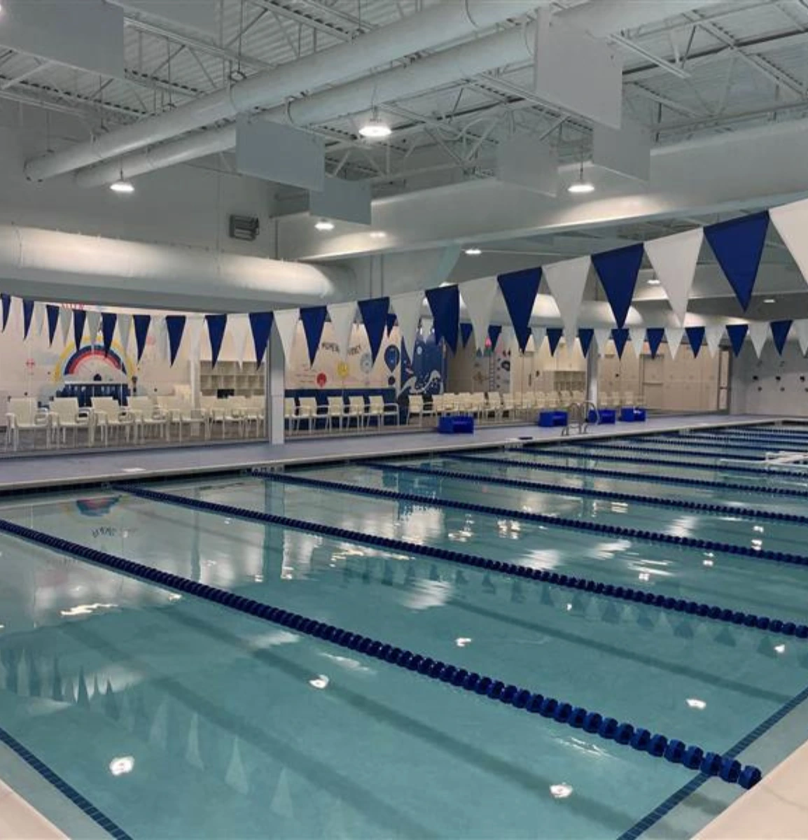 The indoor pool and lane lines of Big Blue Swim School in Plano, TX