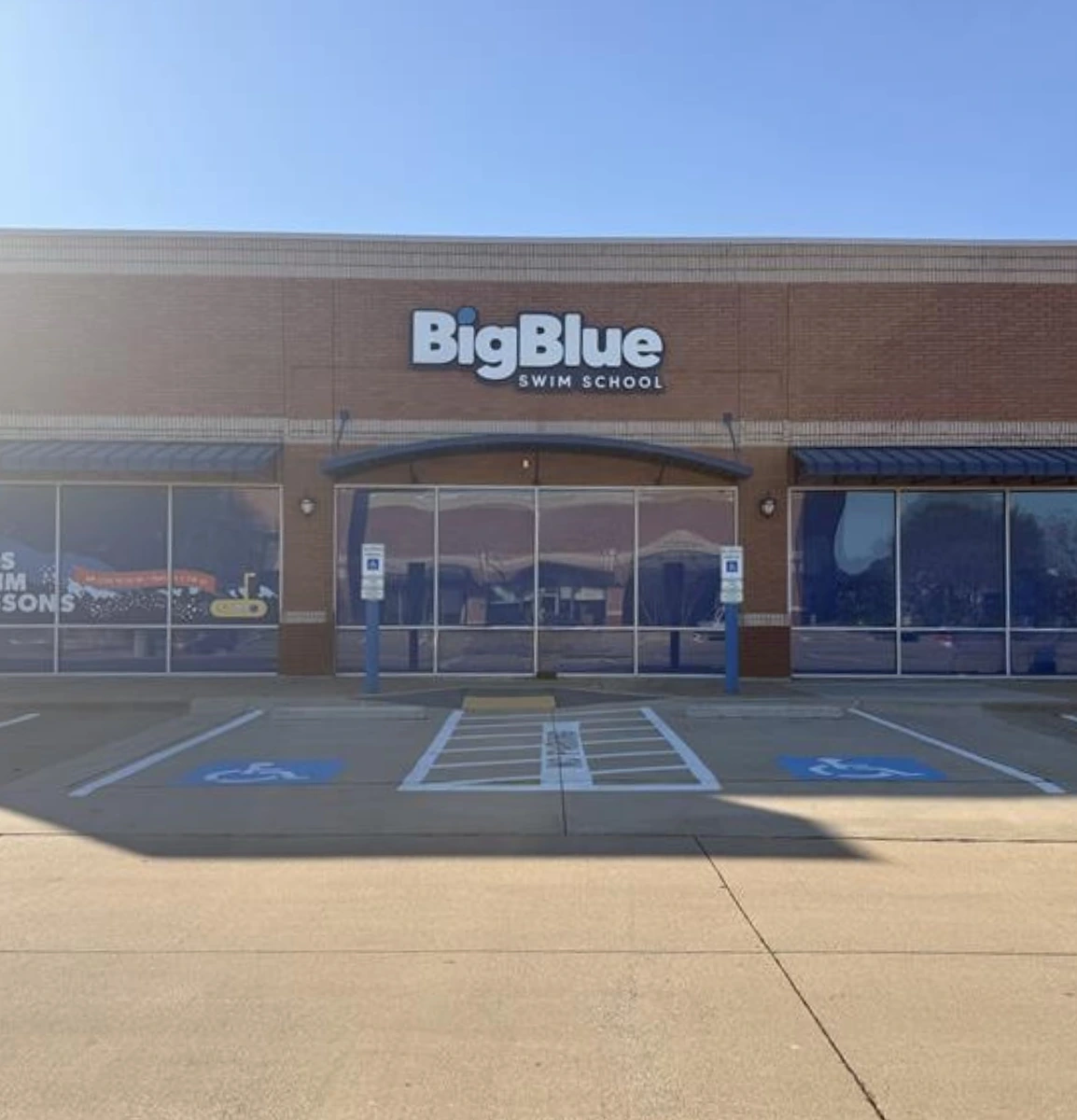 The storefront of Big Blue Swim School in Plano, TX
